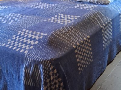 Double bed with bamboo headboard