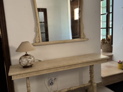 Chest of drawers with mirror.