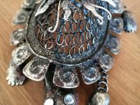 Beautiful figure in metal